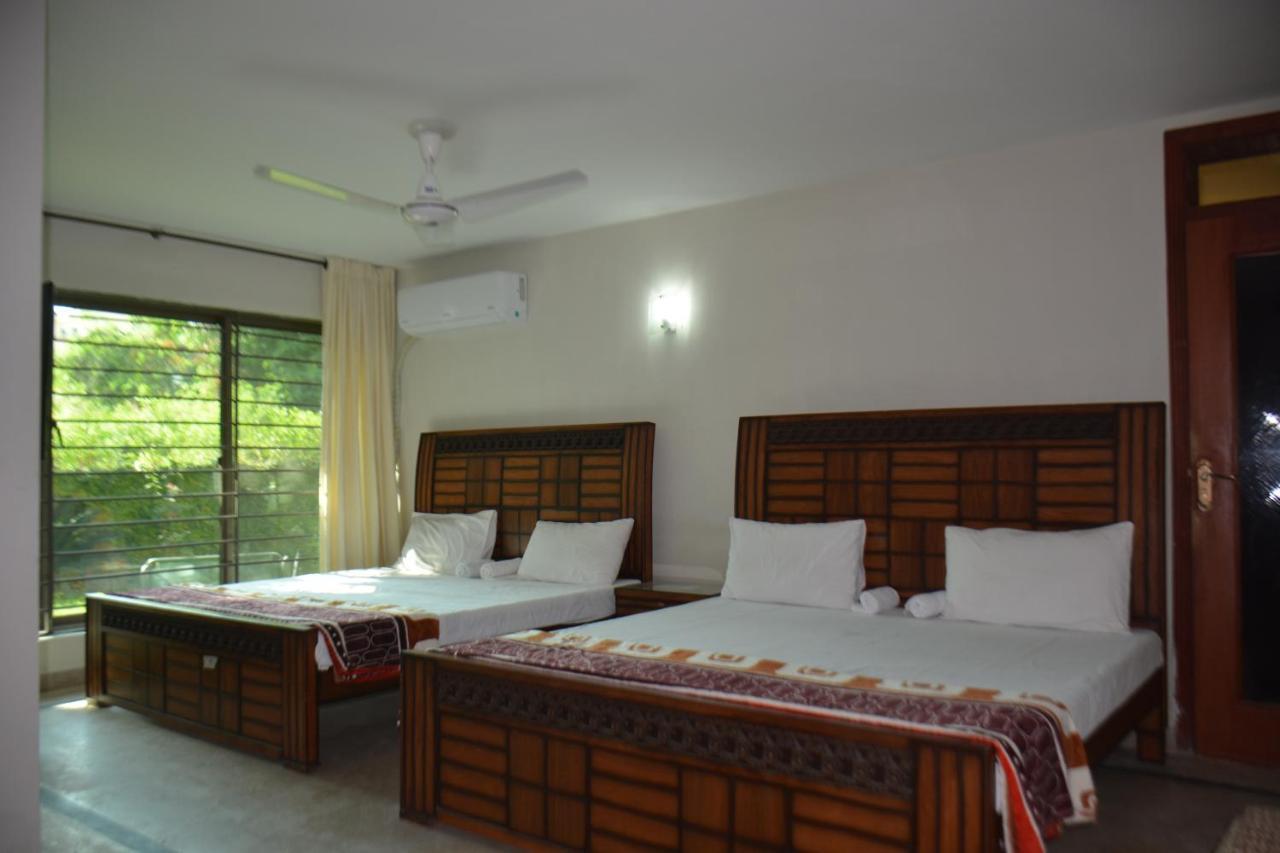 The Travelers Den Hotel Исламабад Екстериор снимка
